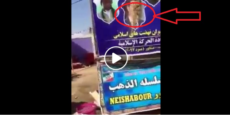 بالفيديو.. عراقي يقوم باهانة صورة للرئيس السوري بشار الاسد على طريق كربلاء